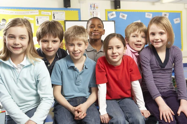 Schoolchildren In classroom — Stock Photo, Image