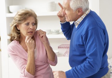 Senior Couple Having Argument At Home clipart