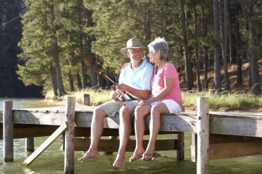 Senior couple fishing clipart