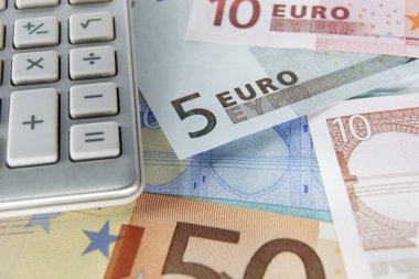 Detail euro notes and calculator clipart