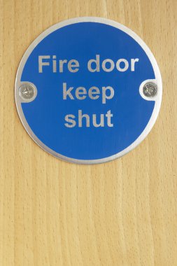 Keep shut sign on fire door clipart