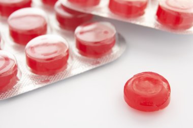 Throat lozenges close up clipart