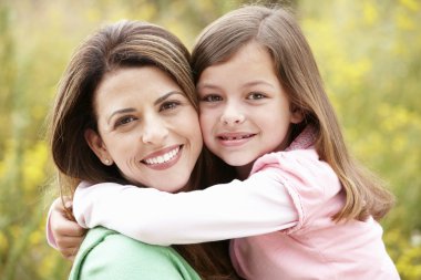 Portrait Hispanic mother and daughter clipart