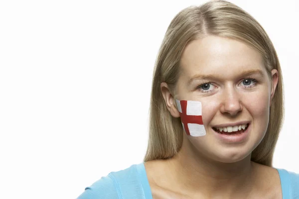 Ventilador deportivo femenino joven con bandera de St Georges pintada en la cara —  Fotos de Stock