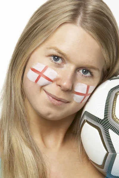 Mladý ženský fotbalový fanoušek s st georges příznak malované na obličej — Stock fotografie