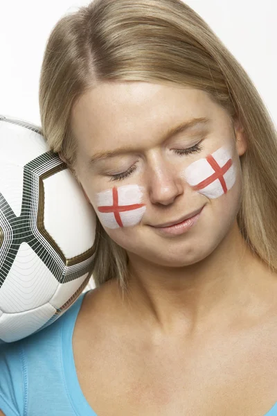 Mladý ženský fotbalový fanoušek s st georges příznak malované na obličej — Stock fotografie