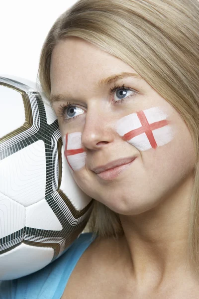Unga kvinnliga fotbollsfan med st georges flagga målade på ansikte — Stockfoto