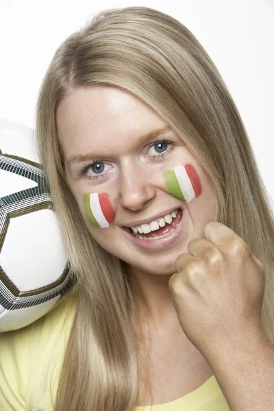 Ung kvindelig sportsfan med italiensk flag malet på ansigt - Stock-foto
