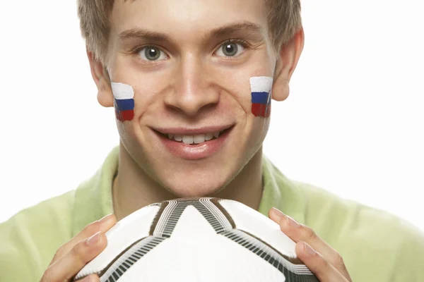 Ung mand fodbold fan med slovakisk flag malet på ansigt - Stock-foto