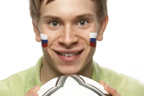 Ventilador de fútbol masculino joven con bandera eslovaca pintada en la cara —  Fotos de Stock