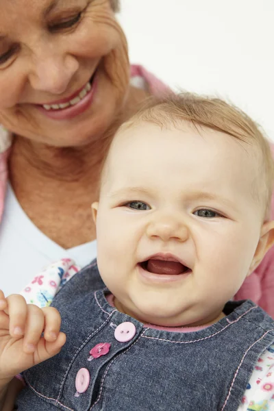 Portrait of senior woman with baby — Stock Photo, Image