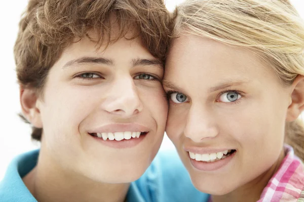 Teenage girl and boy head and shoulders — Stock Photo, Image