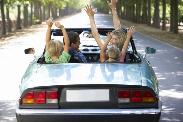 Family in sports car — Stock Photo, Image