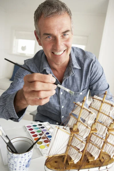 Mid age man model making — Stock Photo, Image