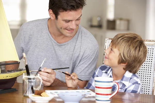 Father model making with son — Stock Photo, Image