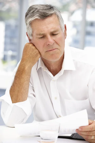 Unhappy senior businessman — Stock Photo, Image