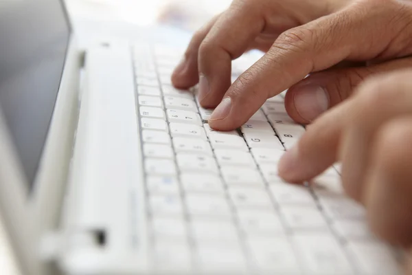 Close up man using computer keyboard — Stock Photo, Image