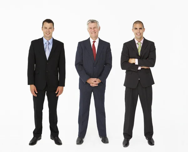 Grupp av affärsmän i studio — Stockfoto