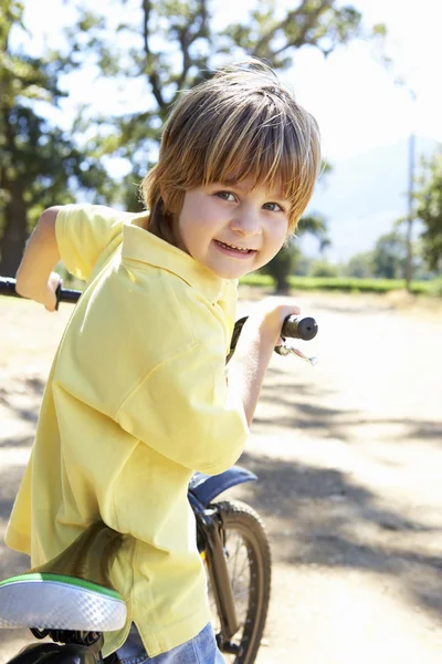 Little boy on country bike ride — Stock Photo, Image