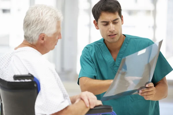 Senior patient with young doctor — Stock Photo, Image