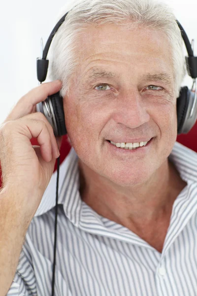 Senior man with headphones — Stock Photo, Image