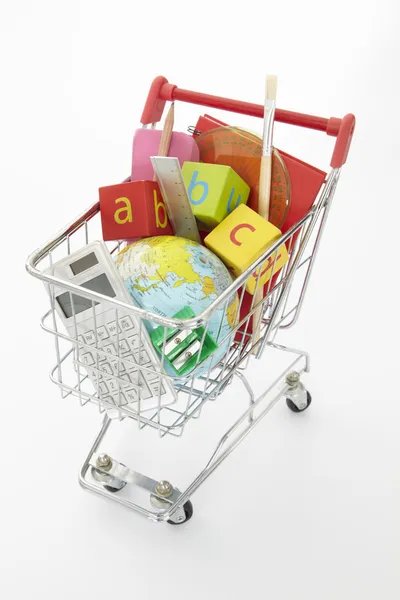 Trolley full of items for school — Stock Photo, Image