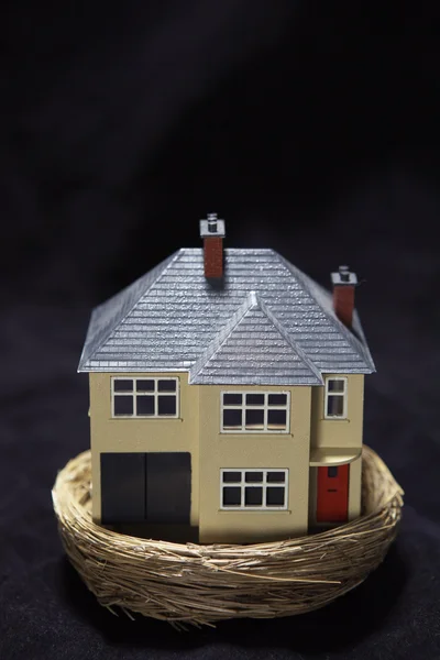 Model house in a basket — Stock Photo, Image