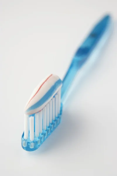 Toothbrush loaded with toothpaste — Stock Photo, Image