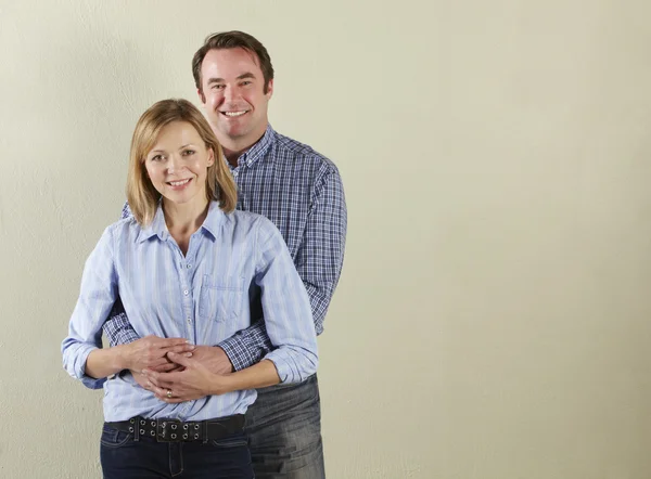 Studio Shot Of Relaxed Middle Aged Couple — Stock Photo, Image