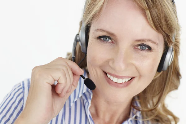 Businesswoman wearing headset Royalty Free Stock Images
