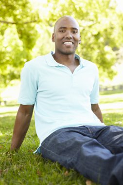 Young man portrait outdoors clipart