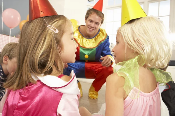 stock image Clown entertaining children at party