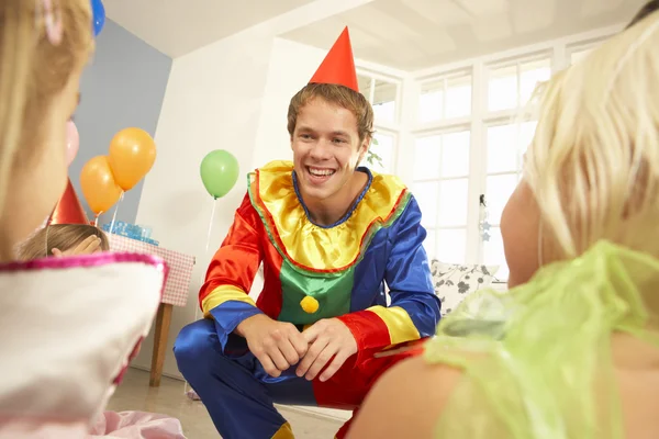 stock image Clown entertaining children at party