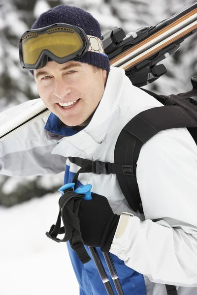 Middle Aged Man On Ski Holiday In Mountains — Stock Photo, Image
