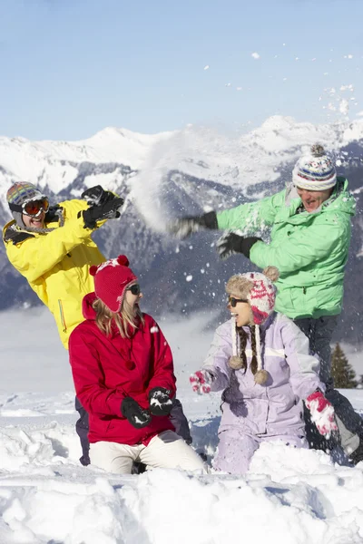 Teenage Family Having Snow Fight In Mountains — Stock Photo, Image
