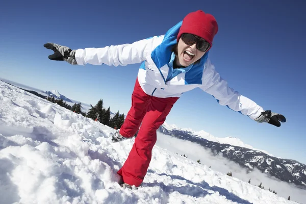 Woman Having Fun On Ski Holiday In Mountains — Stock Photo, Image