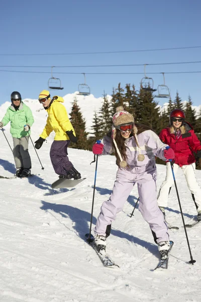Teenage Family On Ski Holiday In Mountains Stock Image