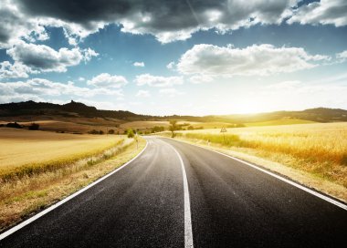 Asphalt road in Tuscany Italy clipart