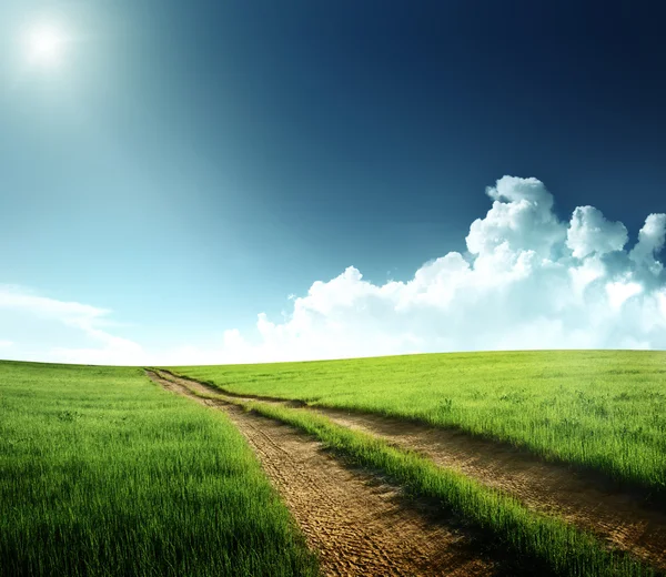 Ground road and summer sunny day — Stock Photo, Image