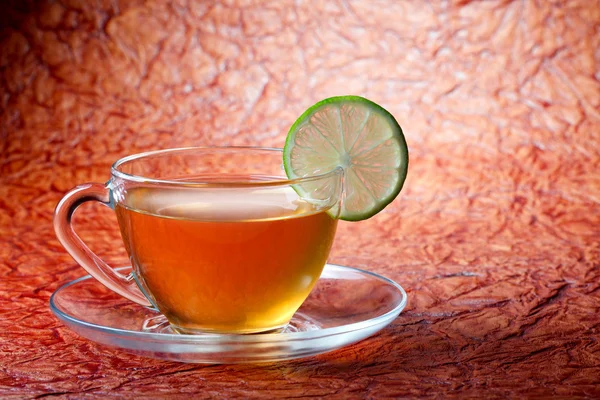 Taza de té en textura de fondo —  Fotos de Stock