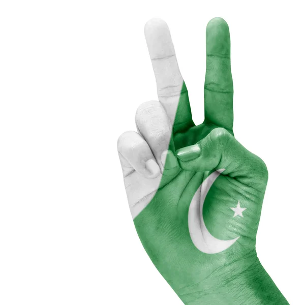 Pakistanische Flagge zur Hand. — Stockfoto