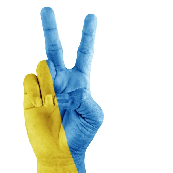 Флаг Украины под рукой . — стоковое фото