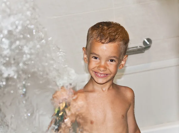 stock image Cheerful smiling boy in the bathroom