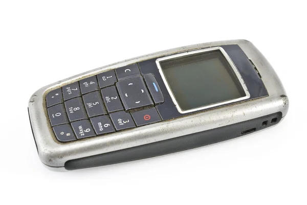 Velho telefone celular empoeirado — Fotografia de Stock