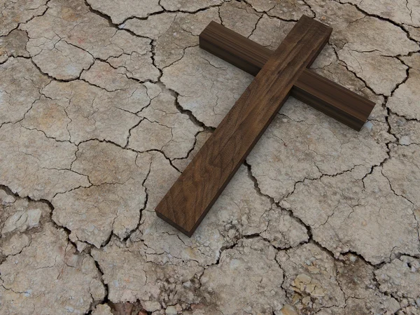 Cross on dry ground — Stock Photo, Image