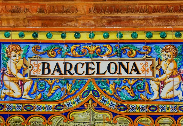Barcelona znamení přes zeď mozaika — Stock fotografie