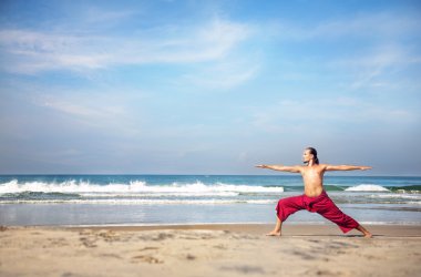 Yoga on the beach clipart