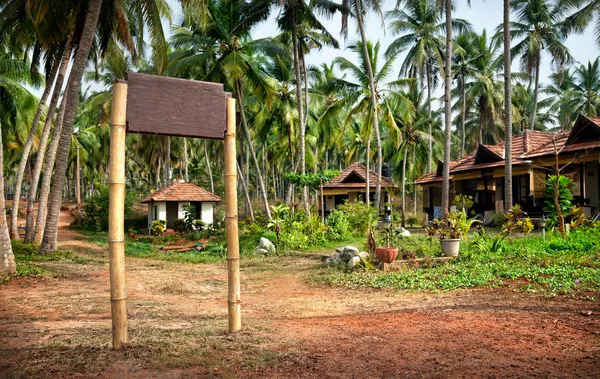 Località tropicale con cartello — Foto Stock