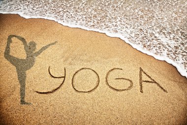 Yoga on the sand clipart