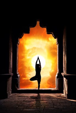 Yoga silhouette in temple clipart